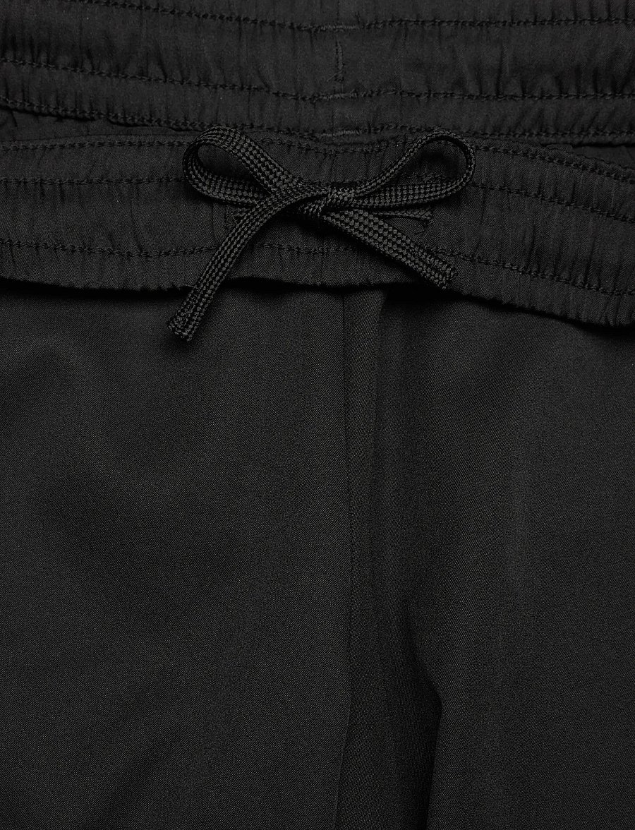 PUMA - TAD ESS Woven Tapered Pants B - spodnie dresowe - puma black - 3
