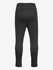 PUMA - EVOSTRIPE Pants DK B - sports bottoms - puma black - 1
