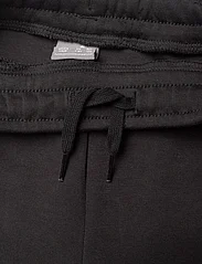 PUMA - EVOSTRIPE Pants DK B - sports bottoms - puma black - 2