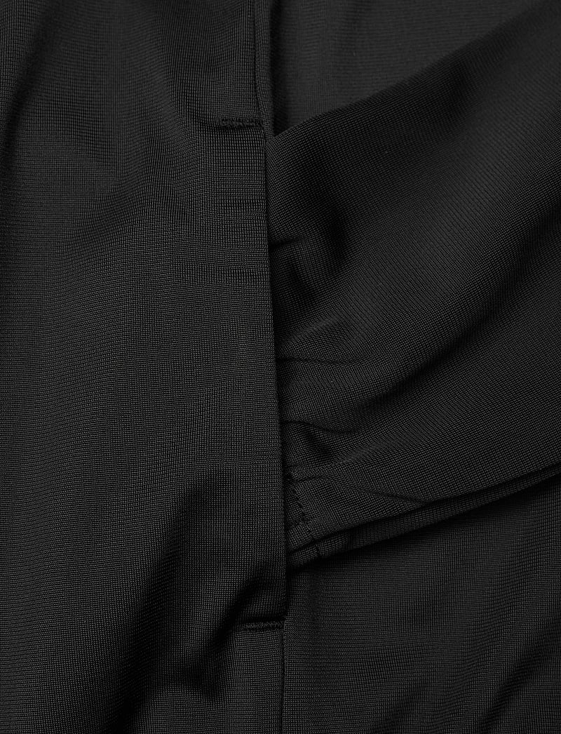 PUMA - Poly Suit B - treeningriided ja 2-osalised komplektid - puma black - 5