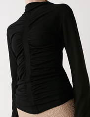 Rabens Saloner - Jeeva - Wool jersey gathered top - long-sleeved shirts - black - 2