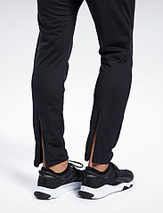 Reebok Performance - ID TRAIN KNIT PANT - sports pants - black - 3