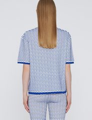 REMAIN Birger Christensen - Wave Knit Polo Shirt - t-shirts & tops - bright white comb. - 3