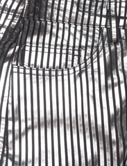 REMAIN Birger Christensen - Striped Leather Pants - festtøj til outletpriser - black comb. - 2