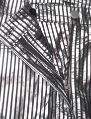 REMAIN Birger Christensen - Striped Leather Pants - vakarėlių drabužiai išparduotuvių kainomis - black comb. - 3