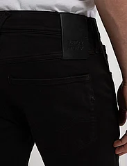 Replay - ANBASS Trousers SLIM Hyperflex Colour XLite - džinsa bikses ar tievām starām - black - 5