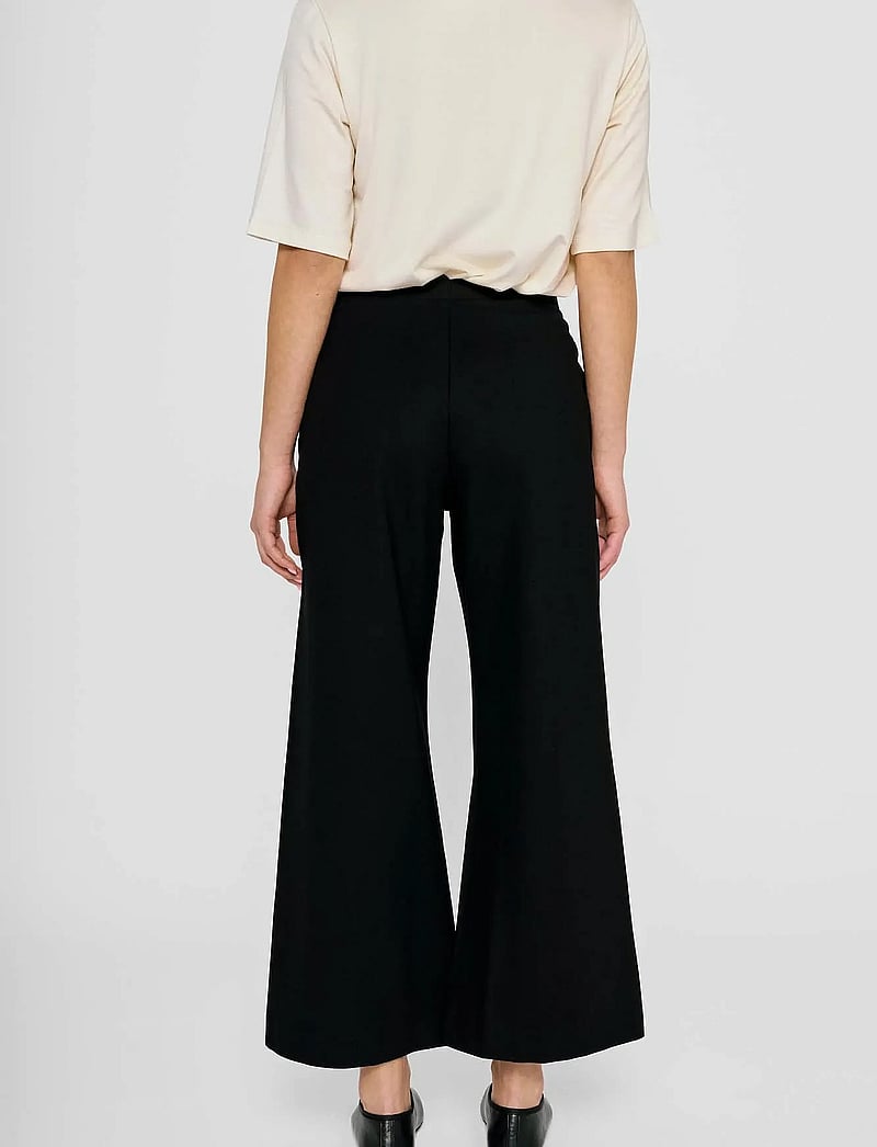 Residus - LOTTIE WIDE PANTS - wide leg trousers - black - 3