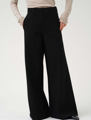 Residus - LAVA PANTS - party wear at outlet prices - black - 2