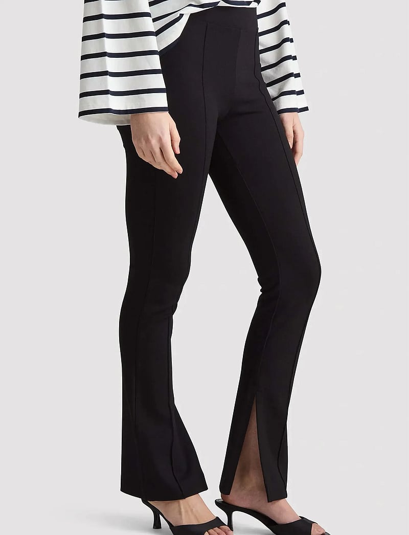 Residus - LUCY PANTS - flare bukser - black - 0