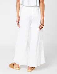 Rip Curl - IBIZA WIDE LEG PANT - ballīšu apģērbs par outlet cenām - white - 4