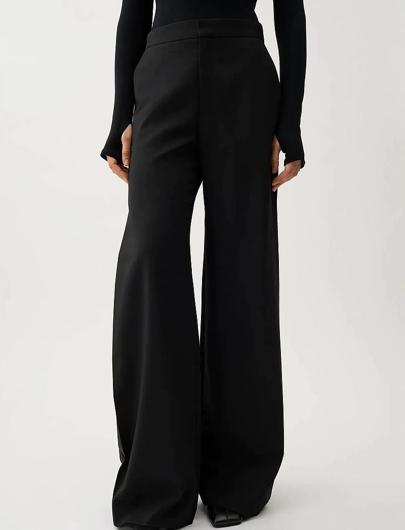 RODEBJER - Rodebjer Nora Fluid - wijde broeken - black - 0