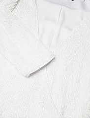 ROTATE Birger Christensen - SEQUIN MIDI WRAP DRESS - ballīšu apģērbs par outlet cenām - egret - 2