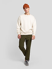 Revolution - Loose trousers with vintage wash and elastic waist - spodnie na co dzień - army - 2