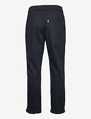 Revolution - Loose trousers with vintage wash and elastic waist - kasdienio stiliaus kelnės - navy - 1