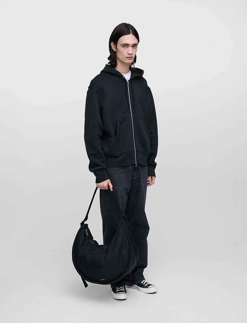 SANDQVIST - CURVE Crossbody Round L - erilised sündmused - black - 2