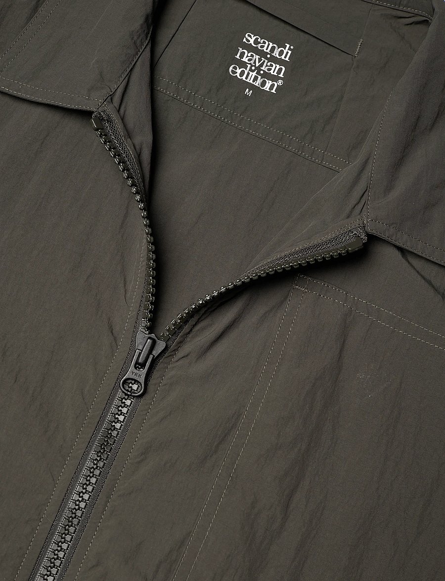 Scandinavian Edition - MOTION - kevadjoped - dk. olive - 2