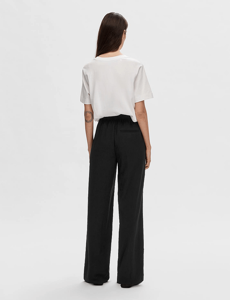 Selected - SLFTINNI-RELAXED MW WIDE PANT N NOOS - hosen mit weitem bein - black - 3