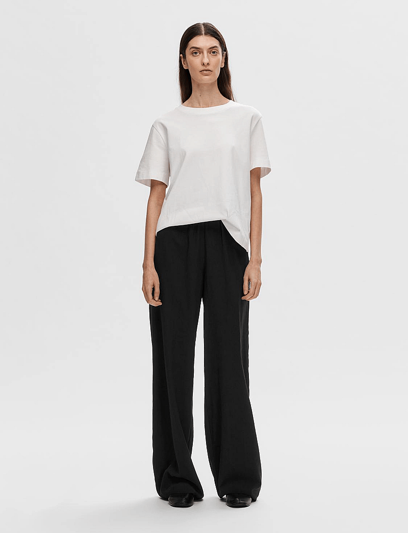 Selected - SLFTINNI-RELAXED MW WIDE PANT N NOOS - hosen mit weitem bein - black - 4
