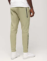 Superdry Sport - SPORT TECH LOGO TAPERED JOGGER - pants - seagrass green - 6