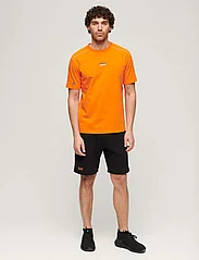 Superdry Sport - SPORT TECH LOGO TAPERED SHORT - sports shorts - black - 6