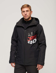 Superdry Sport - SKI FREESTYLE CORE JACKET - ski jackets - black - 2