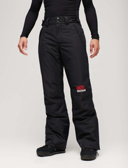 Superdry Sport - FREESTYLE CORE SKI TROUSERS - skiing pants - black - 1