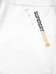 Superdry Sport - SKI SOFTSHELL SLIM TROUSERS - sievietēm - white - 2
