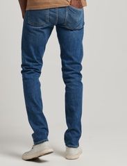 Superdry - VINTAGE SLIM JEANS - džinsa bikses ar tievām starām - mercer mid blue - 4
