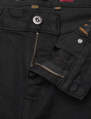 Superdry - VINTAGE SKINNY JEANS - džinsa bikses ar šaurām starām - venom washed black - 6