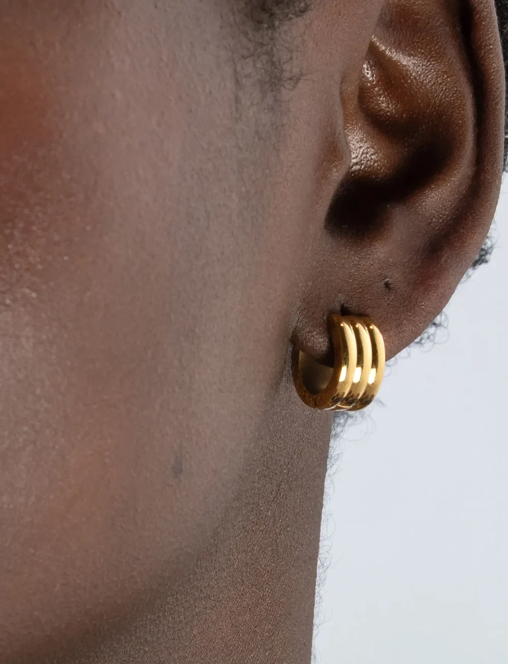 Timi of Sweden - Ruby - Triple Huggie Hoop Earrings Stainless Steel - creoler & hoops - gold - 3