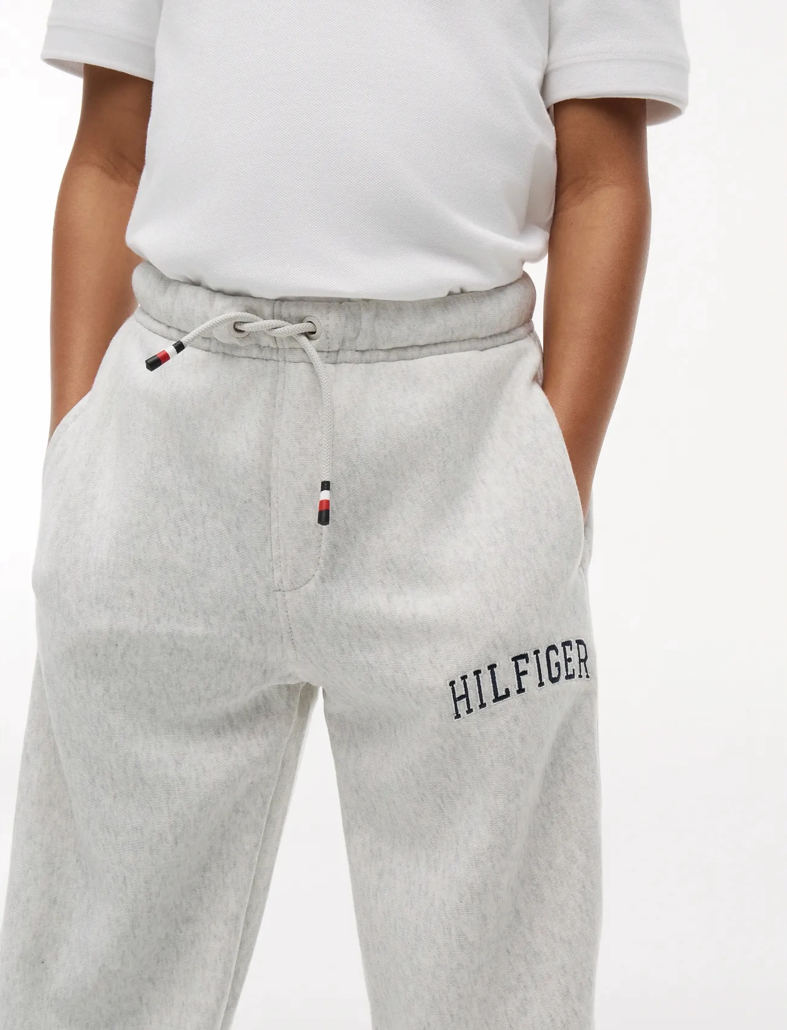 Tommy Hilfiger - HILFIGER VARSITY SWEATPANTS - dressipüksid - light grey heather - 4