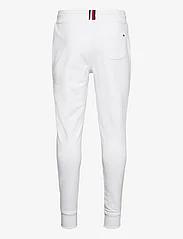 Tommy Hilfiger - TOMMY LOGO SWEATPANTS - spodnie dresowe - white - 1