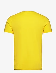 Tommy Hilfiger - STRETCH SLIM FIT TEE - basis-t-skjorter - eureka yellow - 1
