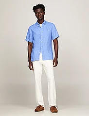 Tommy Hilfiger - PIGMENT DYED LINEN RF SHIRT S/S - short-sleeved shirts - blue spell - 5