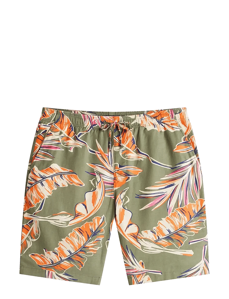 Tommy Hilfiger - MERCER 7IN CO LY BANANA LF SHORT - casual shorts - battle green allover - 1