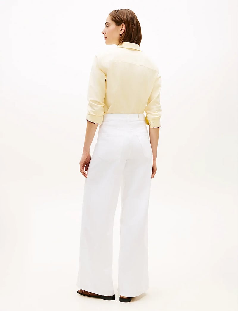 Tommy Hilfiger - DNM CLR 70S WIDE LEG HW - laia säärega teksad - th optic white - 2