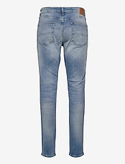 Tommy Jeans - AUSTIN SLIM TAPERED WLBS - džinsa bikses ar tievām starām - wilson light blue stretch - 1