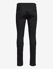 Tommy Jeans - AUSTIN SLIM TAPERED NBKS - džinsa bikses ar tievām starām - new black stretch - 1