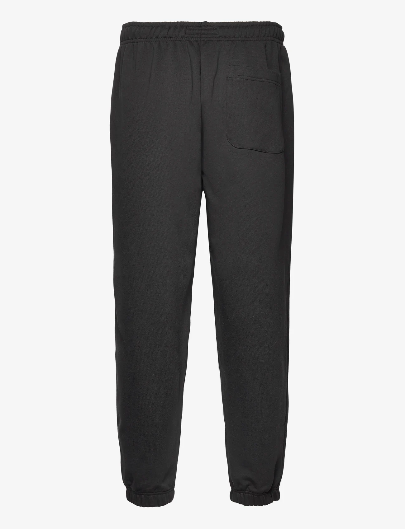Tommy Jeans - TJM RLX SOLID XS BADGE SWEATPANT - spodnie dresowe - black - 1