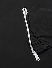 Tommy Jeans - TJM CHICAGO WINDBREAKER EXT - spring jackets - black - 3