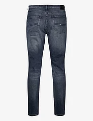 Tommy Jeans - RYAN RGLR STRGHT AH5168 - regular piegriezuma džinsa bikses - denim dark - 1