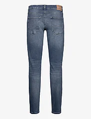Tommy Jeans - SCANTON SLIM BH1264 - džinsa bikses ar tievām starām - denim dark - 1
