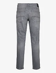 Tommy Jeans - SCANTON SLIM BH1273 - džinsa bikses ar tievām starām - denim black - 1