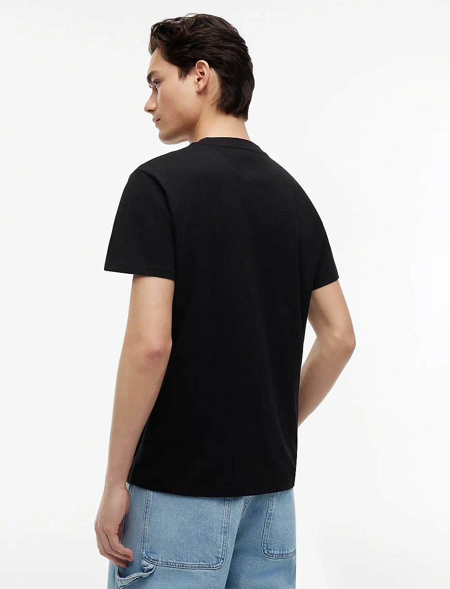 Tommy Jeans - TJM SLIM GRAPHIC TEE EXT - short-sleeved t-shirts - black - 2