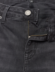 Tommy Jeans - SOPHIE LW FLR AH1280 - utsvängda jeans - denim black - 3