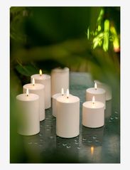 UYUNI Lighting - Outdoor LED Candle - laveste priser - nordic white - 1