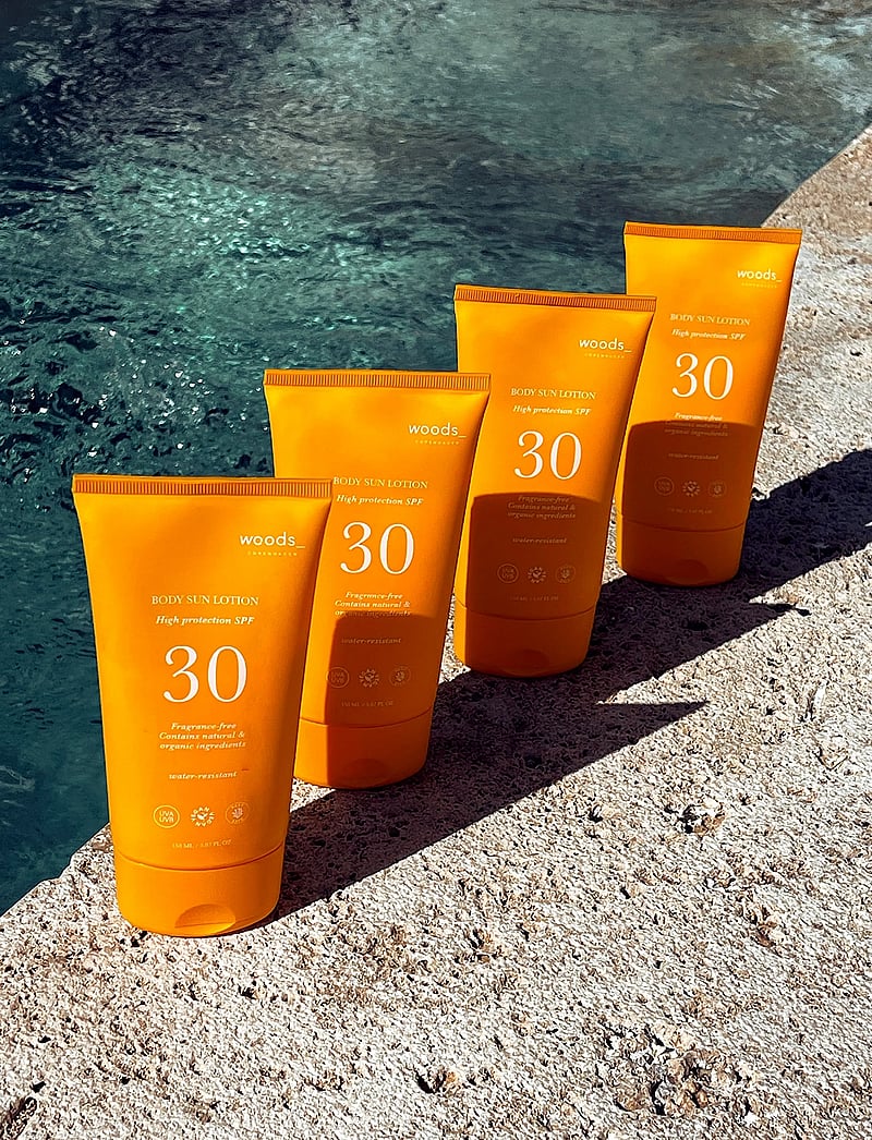 woods_ copenhagen - Body Sun Lotion SPF30 - för kroppen - 1017 - clear - 0