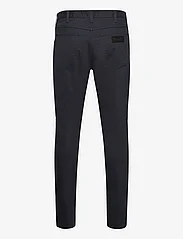Wrangler - LARSTON - slim fit jeans - dark navy - 1